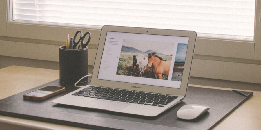 Laptop on desk for writing